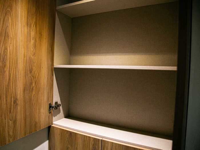 Built-in shelving and storage throughout helps residents make use of the small space.