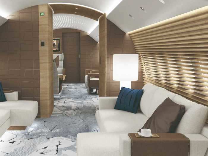 In this concept, passengers walk on to the jet and are immediately greeted with the guest lounge, a living area with two sectional sofas.
