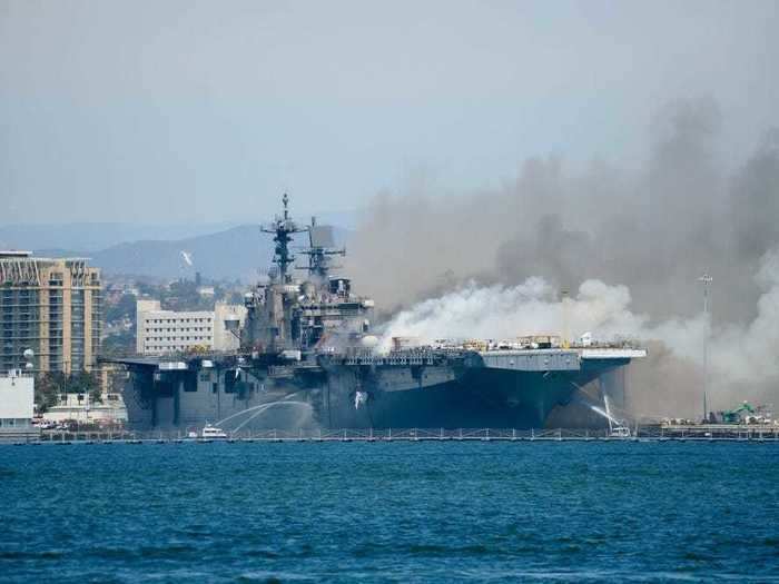 Rear Adm. Philip Sobeck, commander of Expeditionary Strike Group 3, told reporters Sunday evening that while "there was a report of an internal explosion," the Navy is still unclear on the cause of the fire. He insists the ship will sail again.