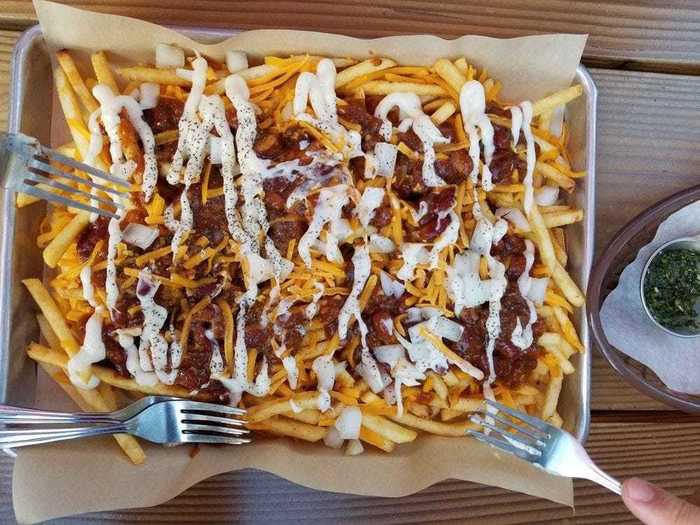  OREGON: Bangers & Brews in Bend, Oregon, has shareable fry platters covered in chili cheese and garlic aioli or bacon, Gorgonzola cheese, onions, and garlic aioli. 