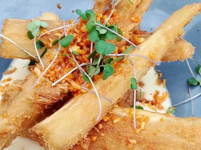 INDIANA: Livery in Indianapolis serves delicious Yuca fries covered in Spanish soubise and Chihuahua cheese.