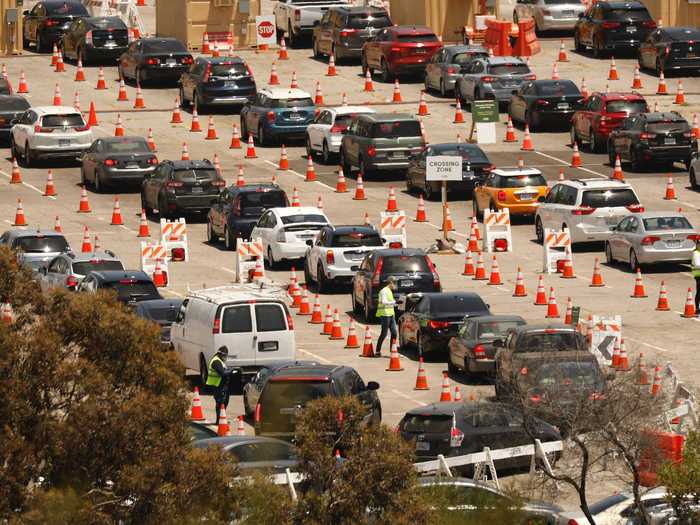 Last week, the LA Times reported that the county can test 26,000 people a day, but some say results take more than a week. The photo below from July 8 shows long lines of cars at Dodgers Stadium.