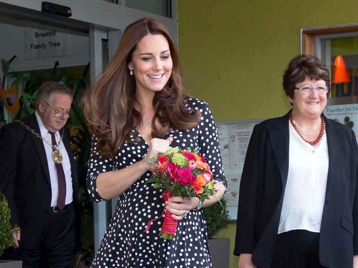 The duchess chose a polka dot wrap dress from ASOS for a visit to a children