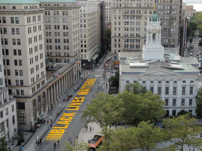 The bright yellow letters allow the mural to be seen from the sky.