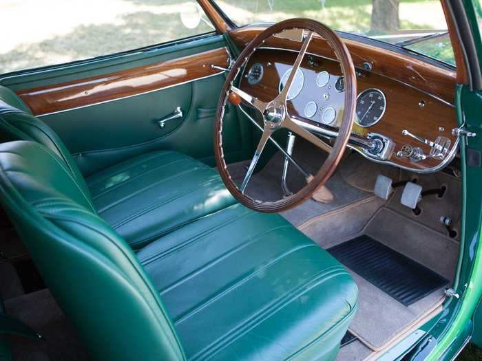 Its green color also extends to the interior upholstery.