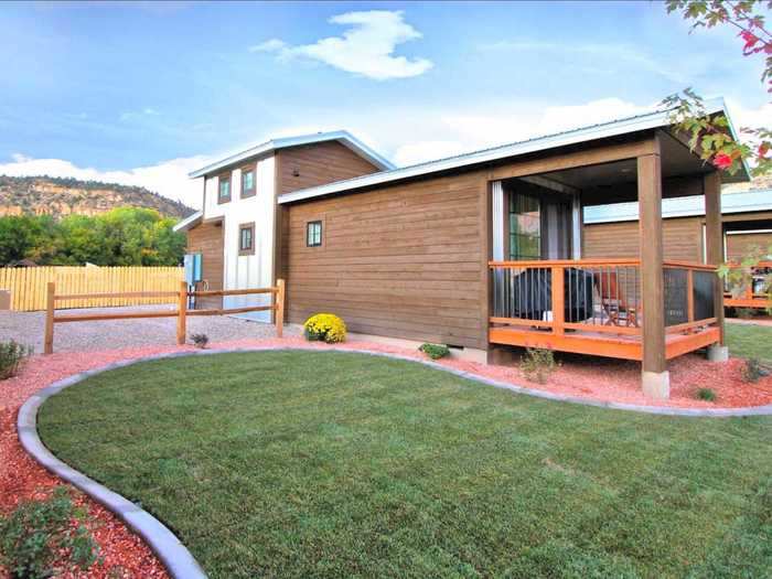 Surrounded by alfalfa farms, these four tiny houses east of Zion in Utah can be booked singularly or altogether. They sit on an acre of private land that