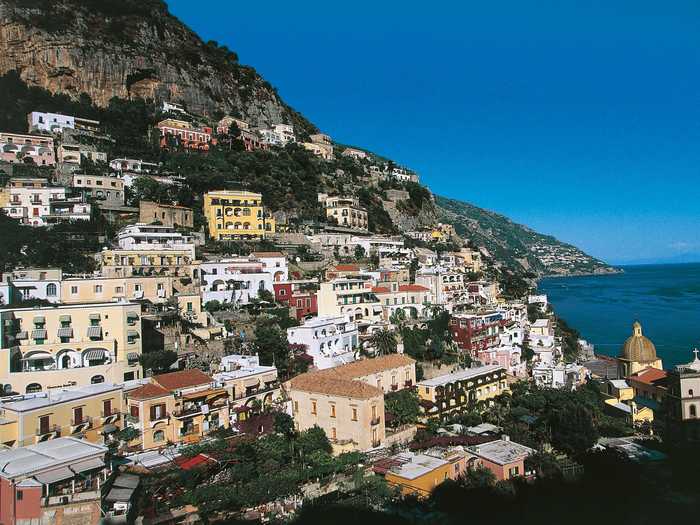 Positano, Italy, hugs the Amalfi Coast, offering residents sweeping views of the sea.