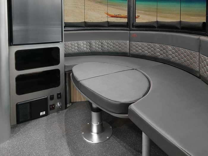 This dining area also doubles as a sleeping or lounge space with the ability to convert in about 30 seconds, according to Airstream.