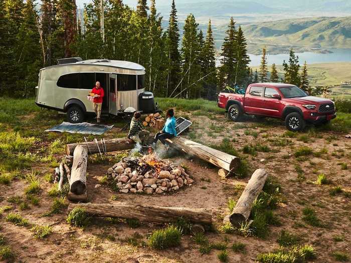 The exterior of both the 20 and 20X have an optional railing system that allows a camping tent to be set up conjoined to and outside of the trailer, according to Airstream