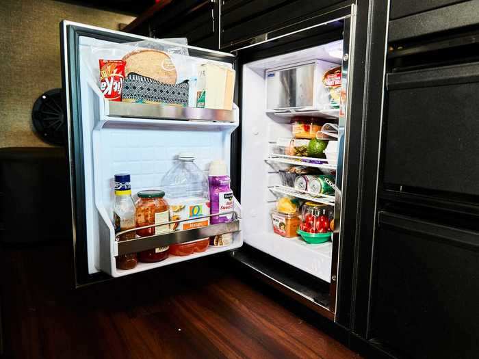 … refrigerator-freezer, and a diesel-powered cooktop for meals on the road.