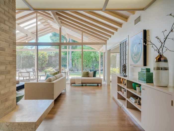 And pristine oak hardwood floors lend a polished feel, working to open up the rooms.