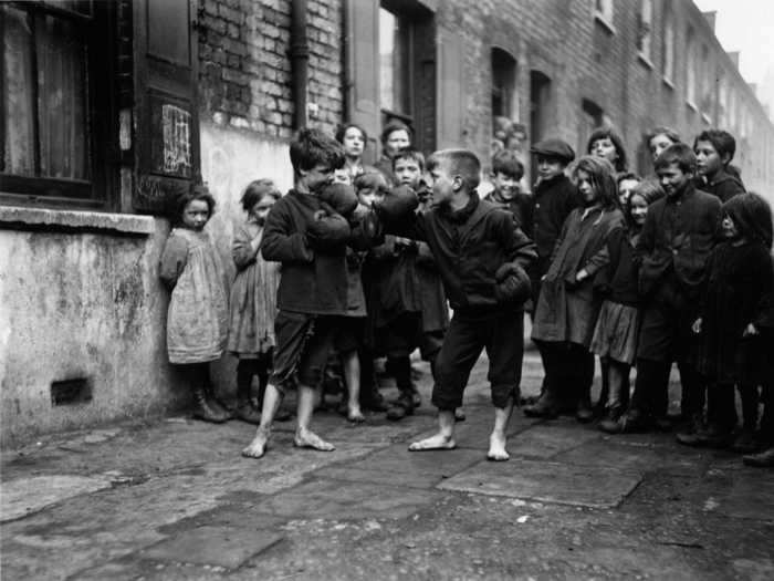 Some children entertained themselves by taking to the streets of London to play fight.