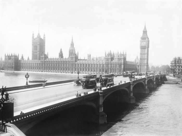 The Houses of Parliament did, however, stand on the Thames at the time.