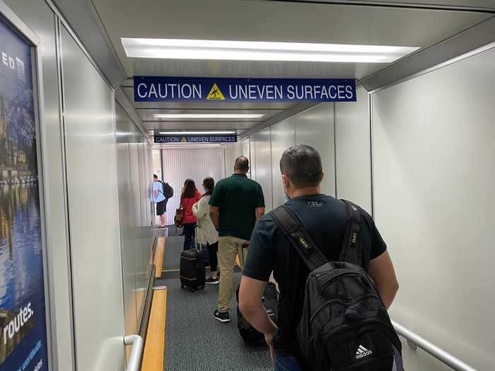 The jetway had no markers or placards reminding people to social distance, though it didn