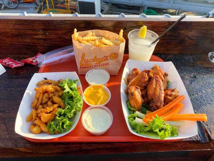 As I waited for my food, my friends received their order of fried clam strips, buffalo wings, and french fries. It was mouth-watering, to say the least. but not cheap as this order came to $30 before drinks.