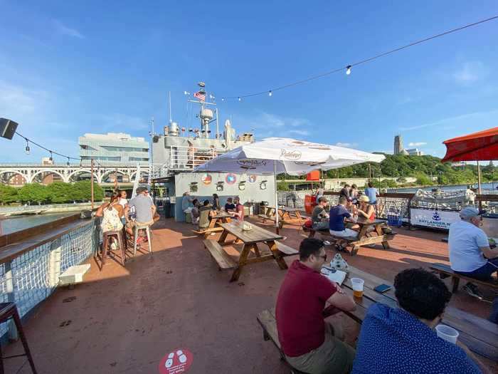 Seating on the main deck included a mix of picnic tables and counters with bar stools along the ship