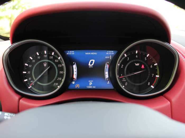 The instrument cluster is all-business, with a customizable screen between the speedometer and tachometer.