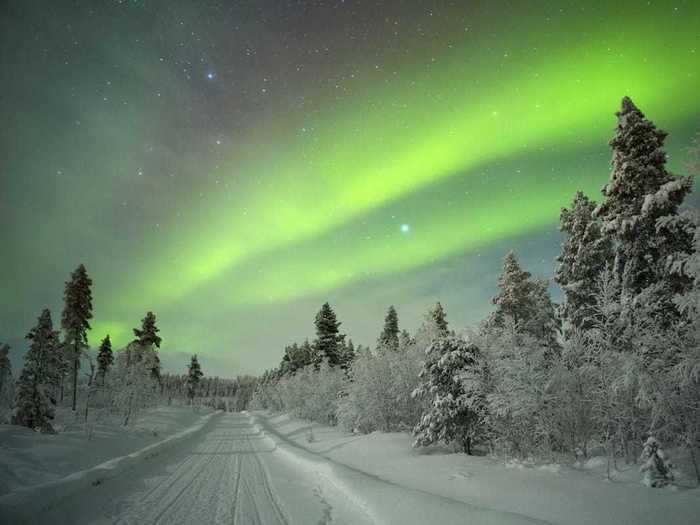 FINLAND: The region of Lapland during Aurora Borealis