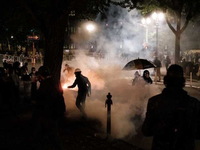 In response, federal agents used impact munitions, stun grenades, and tear gas to clear the area.