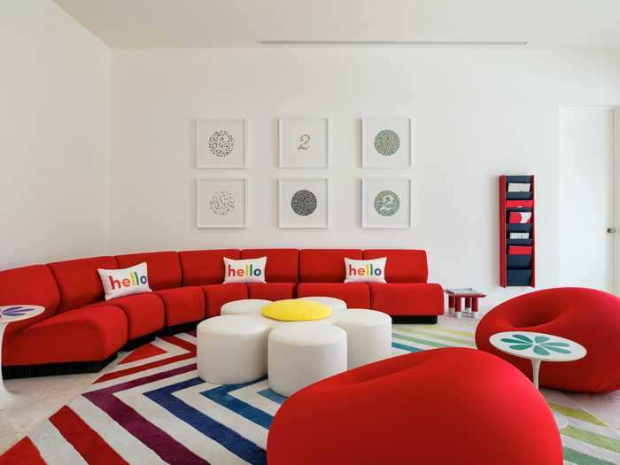 This is another living room which sees Perry make use of vibrant and lively colors.