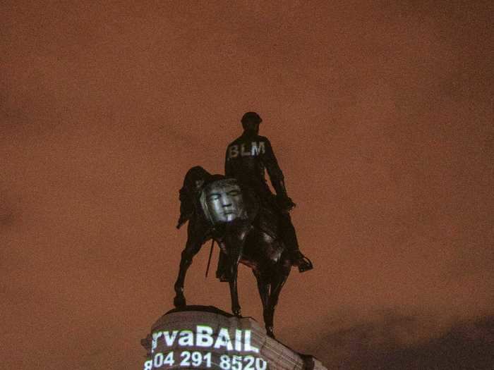 The face of civil rights leader Dr. Martin Luther King Jr. was seen on the monument on June 23, with a message to support a bail fund above it.