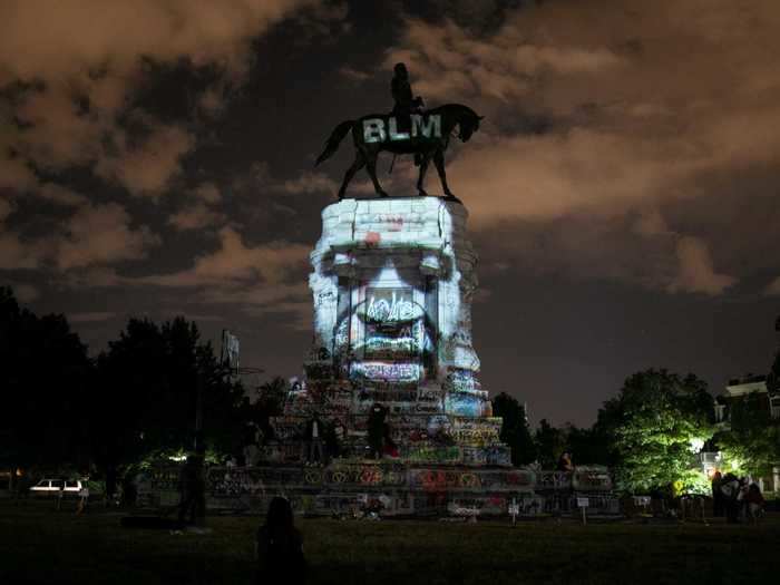 After George Floyd was killed by police on May 25, Virginia-based lighting artist Dustin Klein gathered his equipment and projected an image of him atop the Robert E. Lee statue in Richmond.