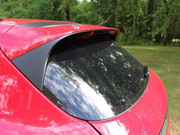 The integrated spoiler helps with performance more than with aesthetics.