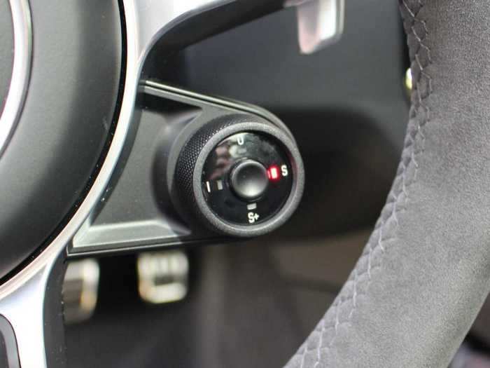 A steering-wheel-mounted selector enables you to switch drive modes: Comfort, Sport, Sport +, and Individual.