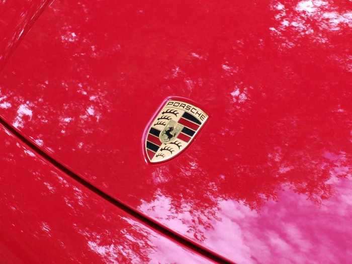 The Porsche badge brings a modest splash of gold to the hood.