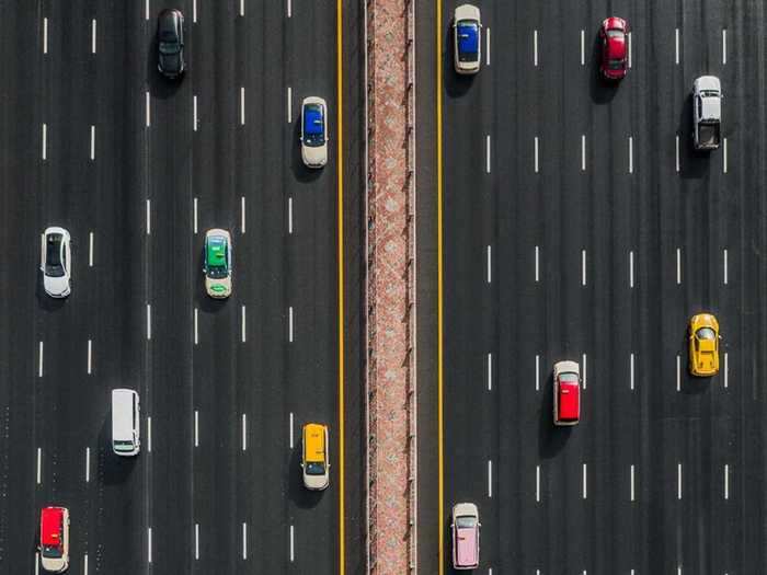 And while in Dubai, they got lucky with a surprise rain that made the road darker and better for this photo.