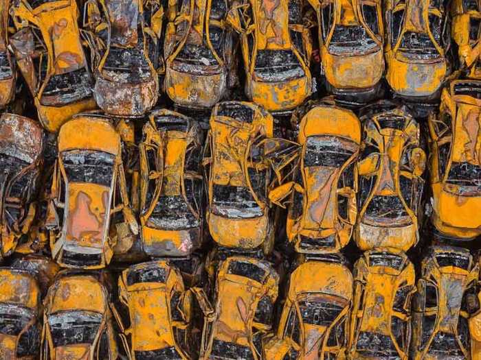 Even with hours of planning, though, sometimes getting the right shot comes down to luck. While on a shoot in Italy, a fire had burned hundreds of cars in an Italian port city and the brothers had inadvertently stumbled upon this graveyard while flying back from their main subject.