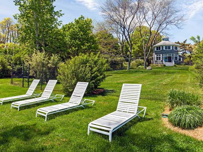 ... or head outside to relax, social distancing style, on chaises by the water.