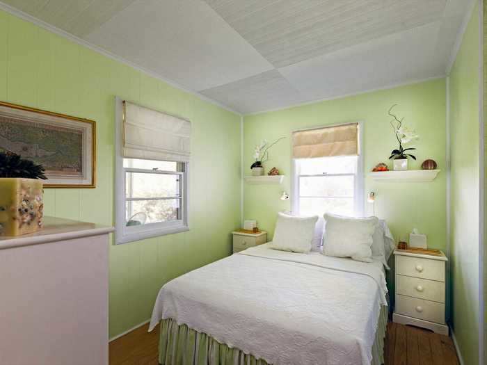 The remaining bedrooms are brightly colored. One sports lime green walls.