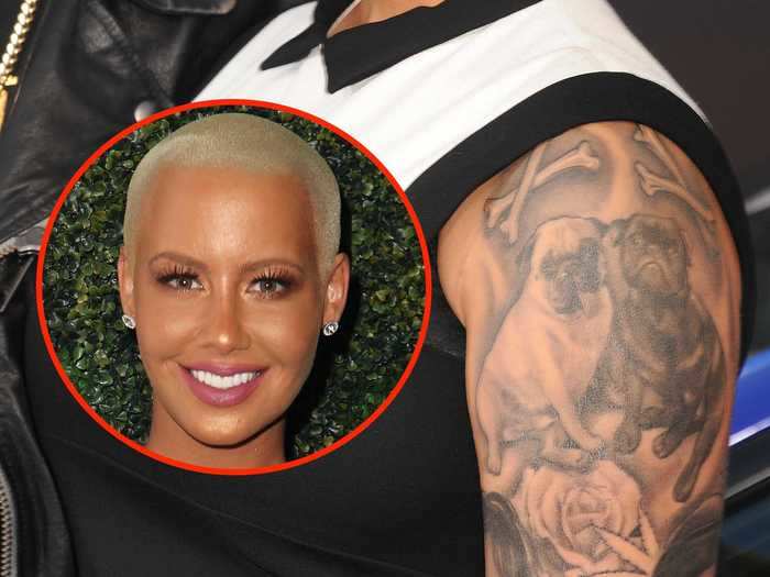 Amber Rose has a portrait of her two pugs, Pauly and Franky, on her arm.