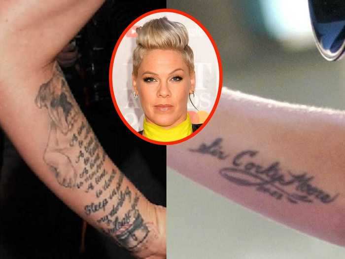 Pink has two tats dedicated to her dogs: a portrait of her bulldog, Elvis, accompanied by a Bible verse and the phrase "Sir Corky Moore 89-03."