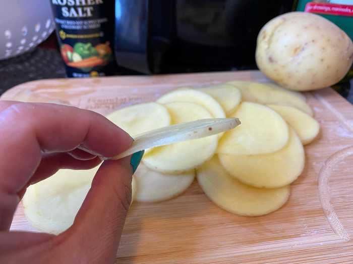 The first step of thinly slicing the potatoes was tedious.