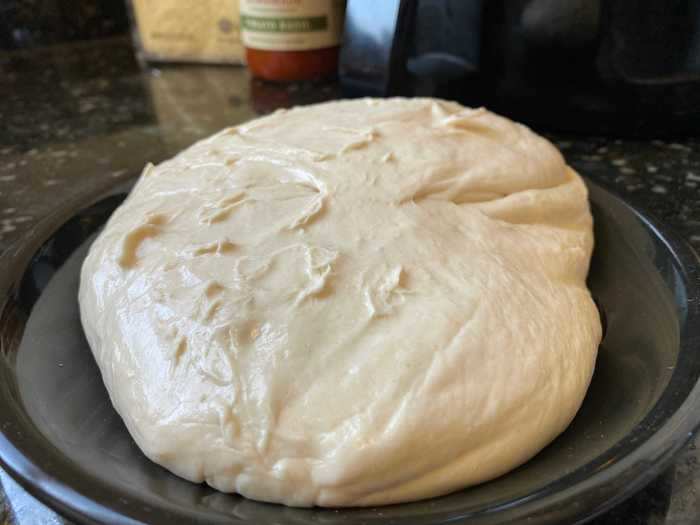 I was excited about the recipe until I realized how much of a pain it was to work with the sticky pizza dough.