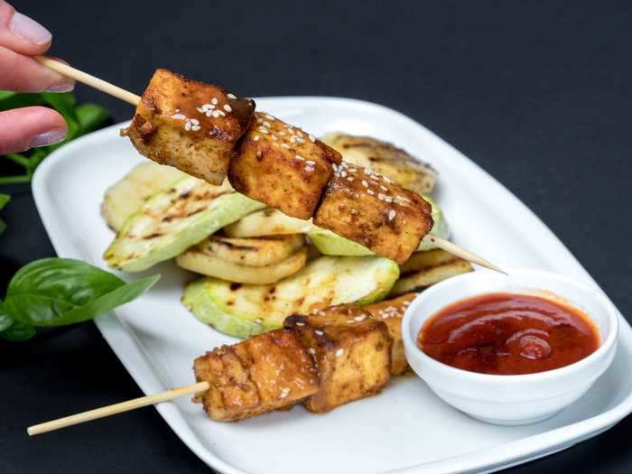 Tofu soaks up a lot of flavor, making it perfect for grilling.