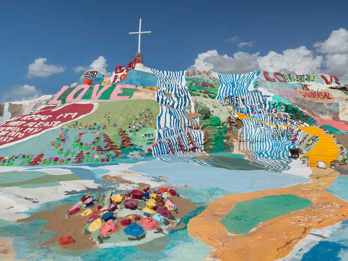 Salvation Mountain in California beckons with its bright colors and psychedelic artwork.