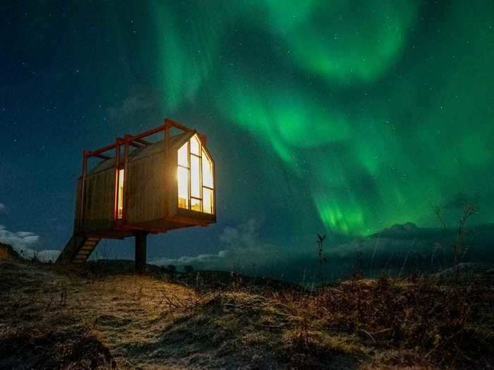 This tiny house is on Fordypningsrommet Fleinvær, an island off Norway, and gives visitors incredible views of the Northern Lights.