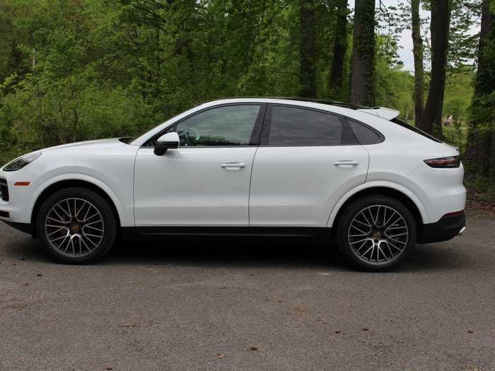 The Cayenne Coupé under consideration here has a sloping roofline, much of which is glass, curving through an integrated spoiler and descending rakishly through a hatchback and terminating with a small, deck lid spoiler.