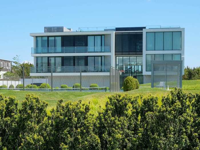 This glass-walled home, for example, is one of the newest houses built on Meadow Lane, completed just last year.