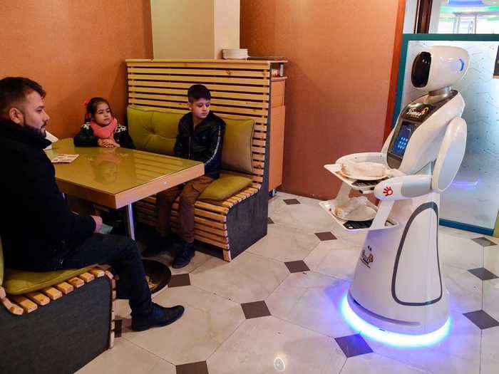 In Kabul, Afghanistan, a Japanese robot named Timea that serves patrons of Times Fast Food has earned the nickname "Nazo," or "beautiful" in the Dari language.