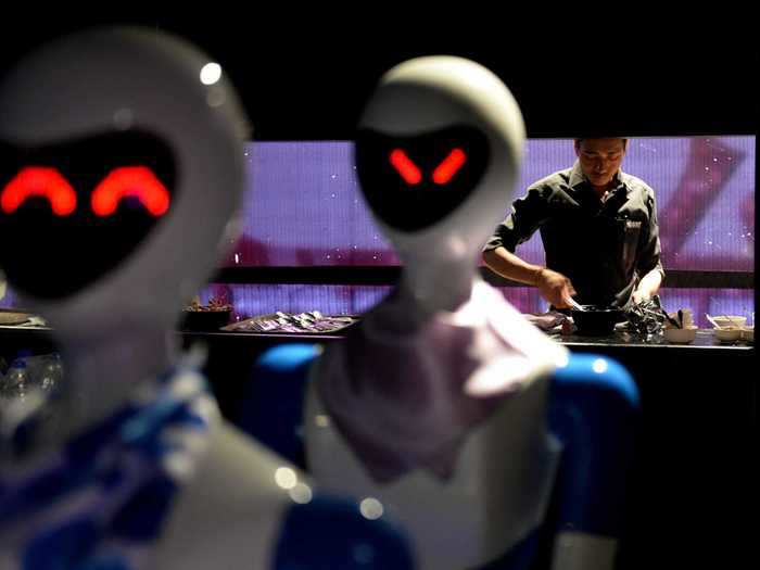 "Robot" restaurant in Chennai employs seven female-esque robot waiters. The robots glide around on magnetic strips to serve customers their food.