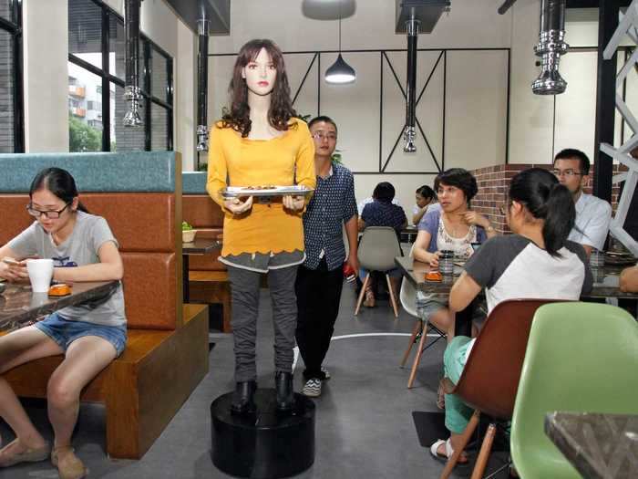 This Chinese server robot made by Kewang Trade Corporation plunges deep into uncanny valley territory with its human-like visage. It can also carry more than 35 kilograms (just over 77 pounds).