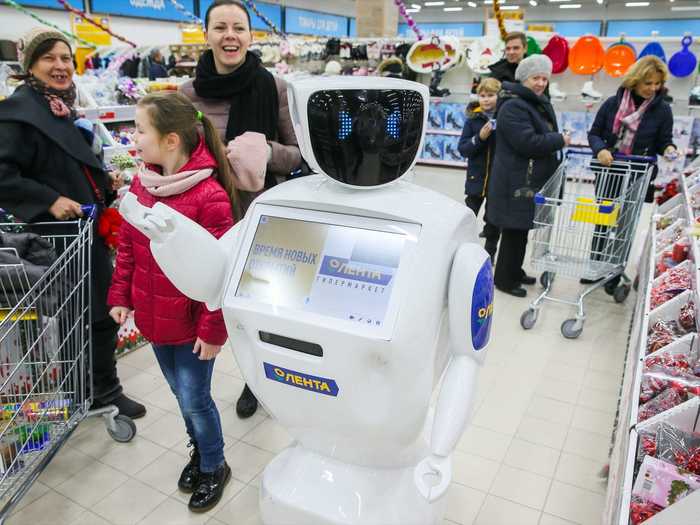 In Moscow, Russia, some Lenta supermarkets are staffed with Promobot robots, which roll around the stores and announce discounts and promotions. They also recognize regular customers and can do product demonstrations.