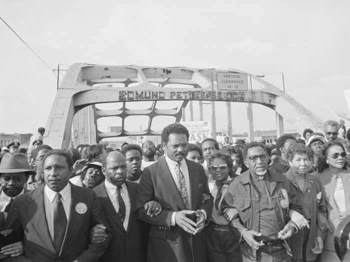 John Lewis first crossed Edmund Pettus Bridge in 1965 to raise awareness about African American voting rights.