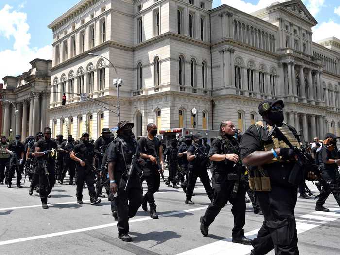 Two armed militia groups clashed in downtown Louisville, Kentucky, on Saturday.