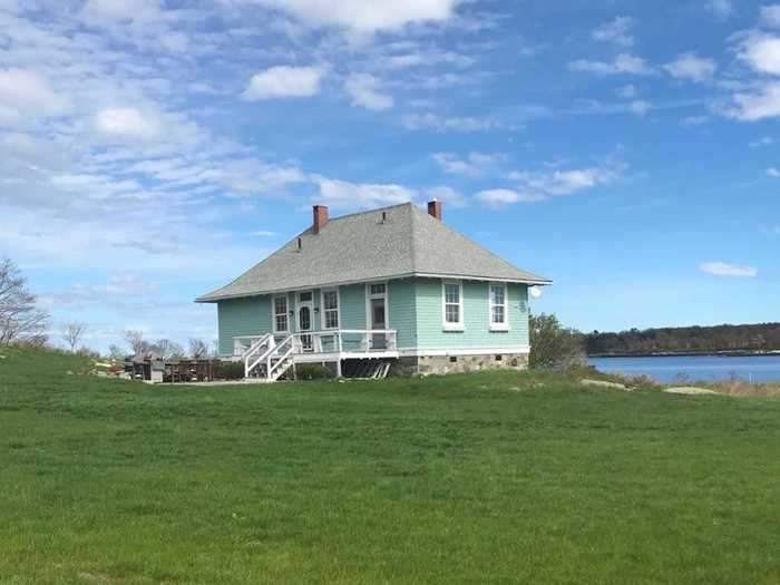 The smallest of the accommodations is the two-bedroom, robins-egg-blue Sunshine Cottage, which enjoys a private view of one of the island