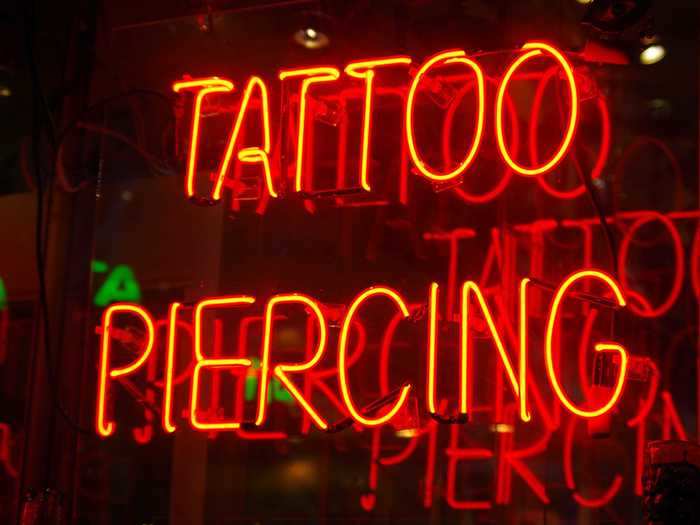 Both artists and clients should act professionally in the tattoo parlor.